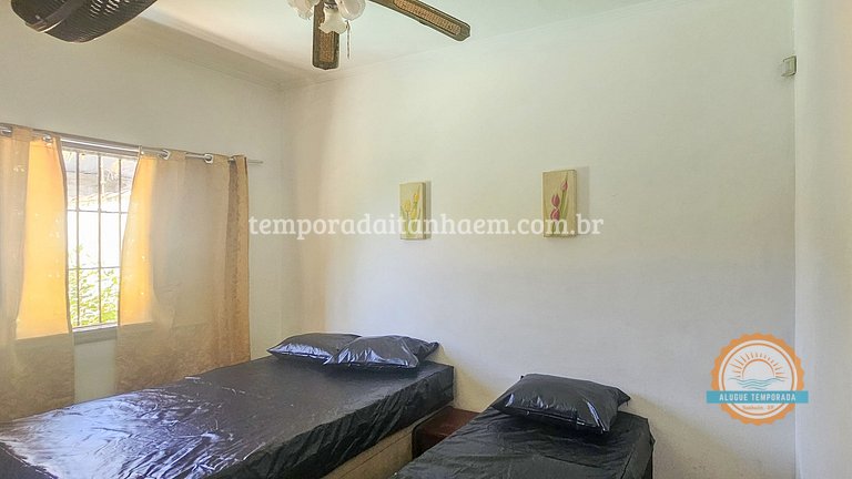 Casa em condomínio na praia com piscina e churrasqueira